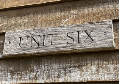 Unit Six door sign